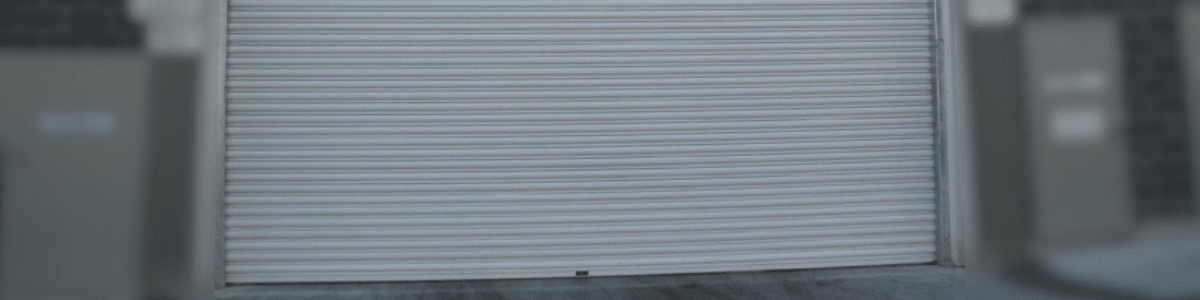 A sleek and modern dark blue roller shutter, perfect for commercial and industrial applications in Melbourne